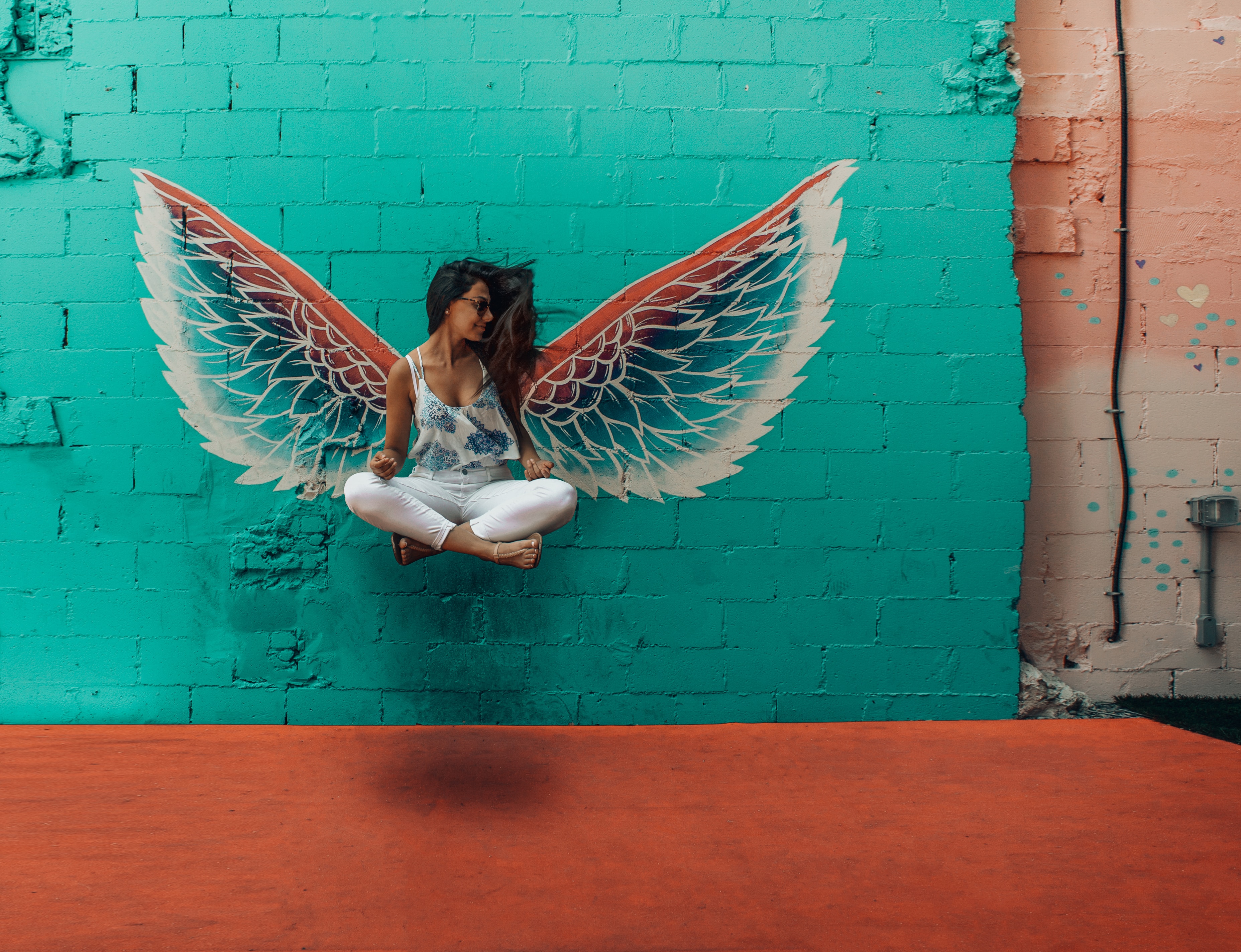 woman with wings floating