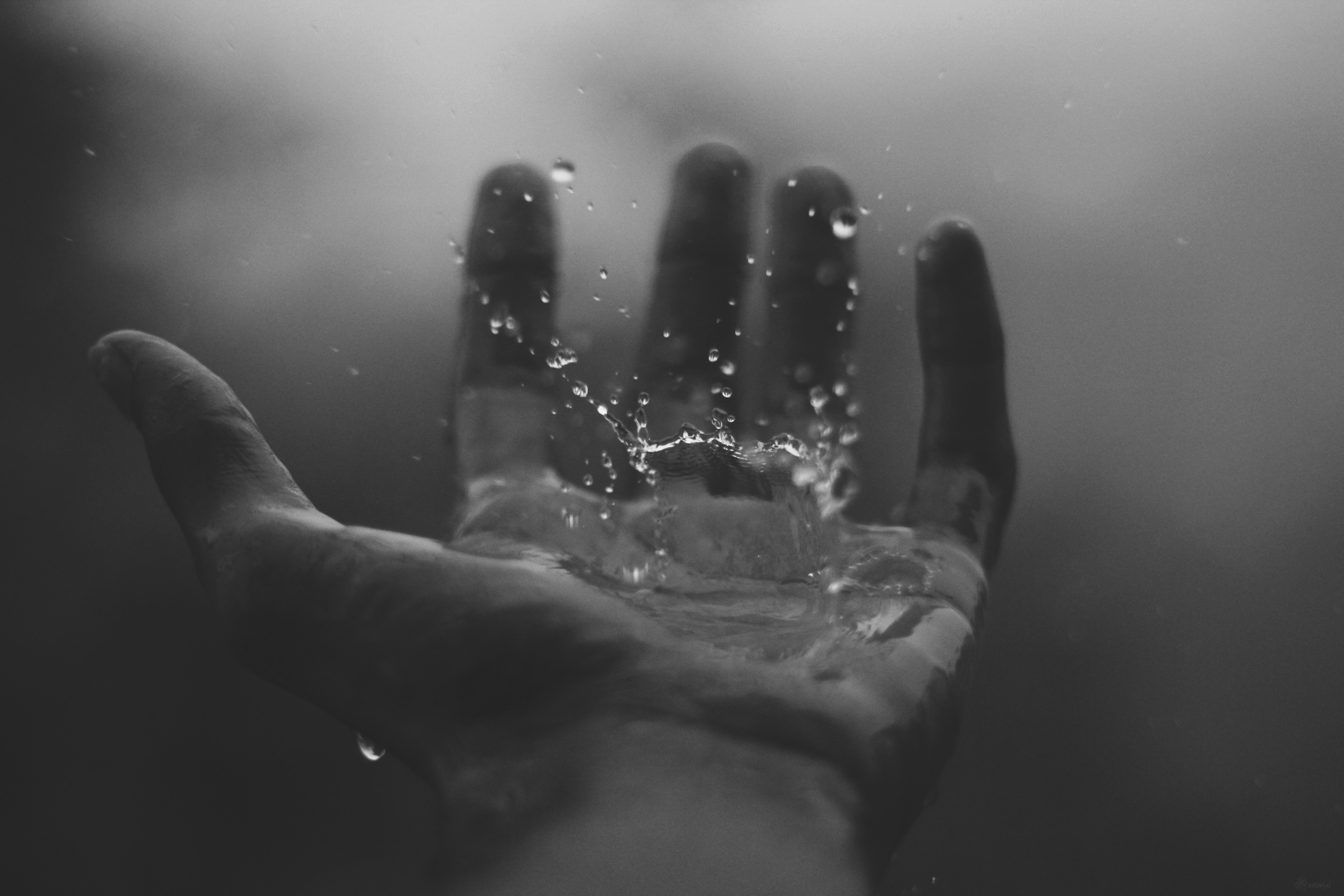 hand with drop of water